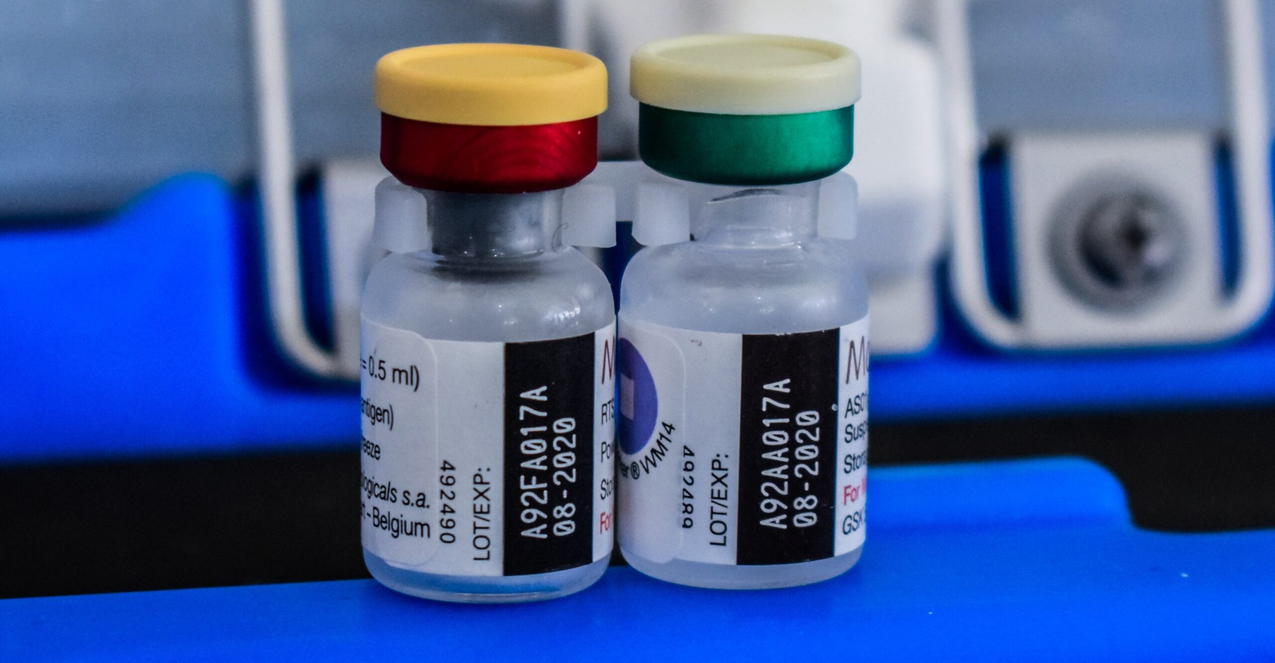 Two malaria vaccine vials.