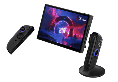 A gaming tablet with a kickstand and two detachable controllers alongside, one of which is oriented vertically on a table as a mouse