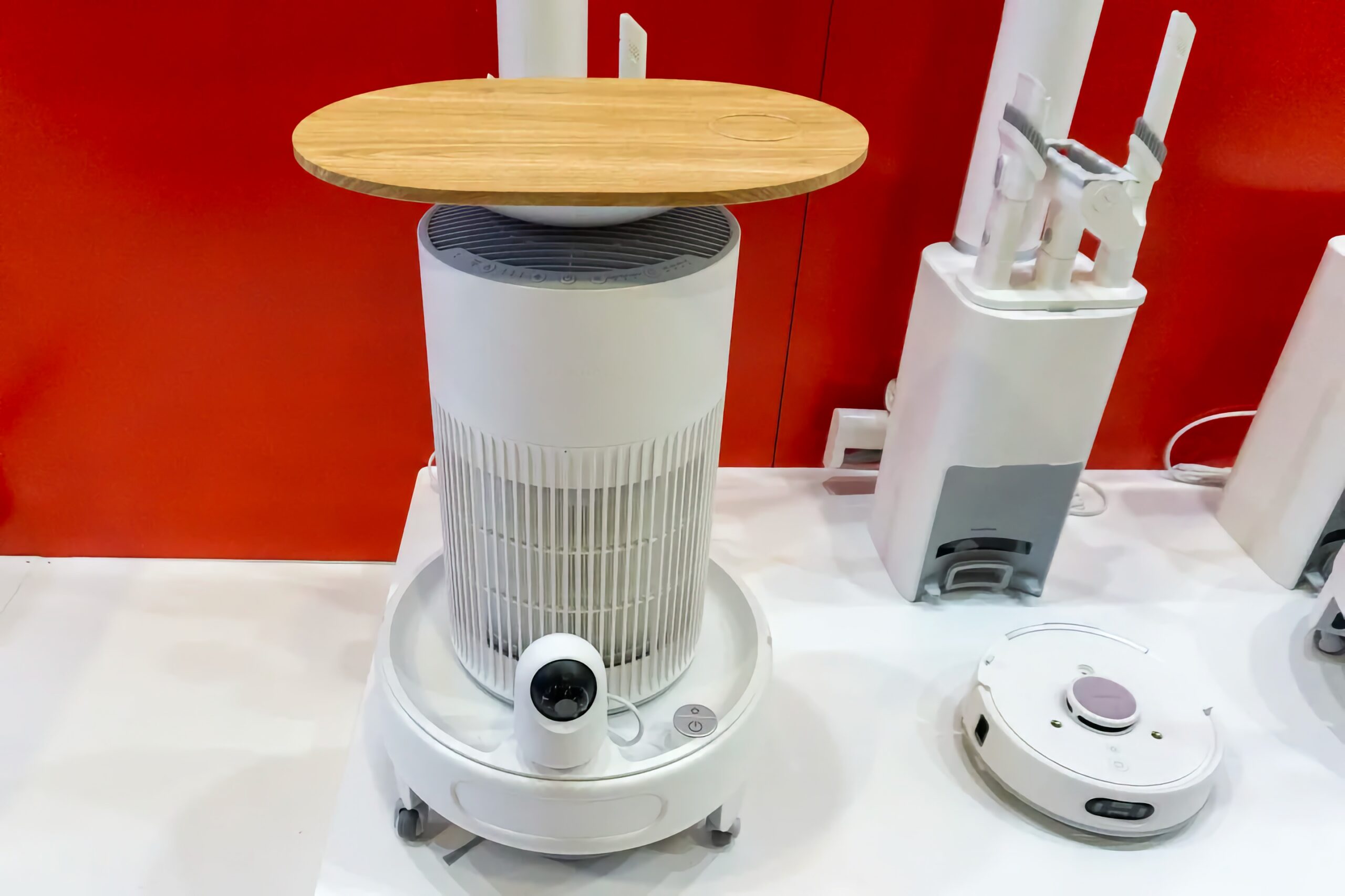 The Switchbot K20+ Pro vacuum with an air purifier and security camera mounted on top.