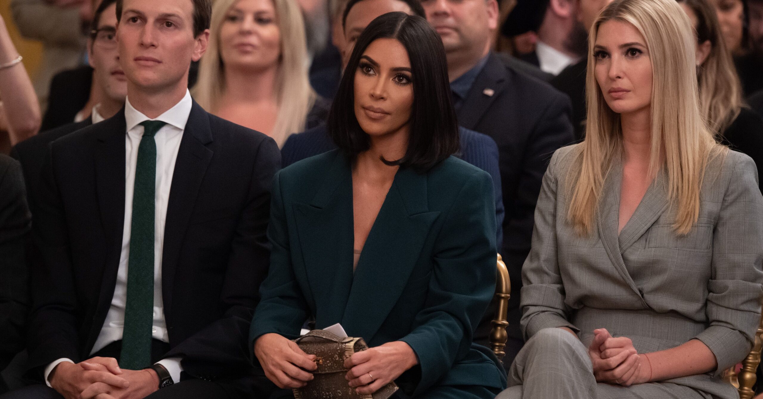 Kim Kardashian, Ivanka Trump, and Jared Kushner sitting in a row