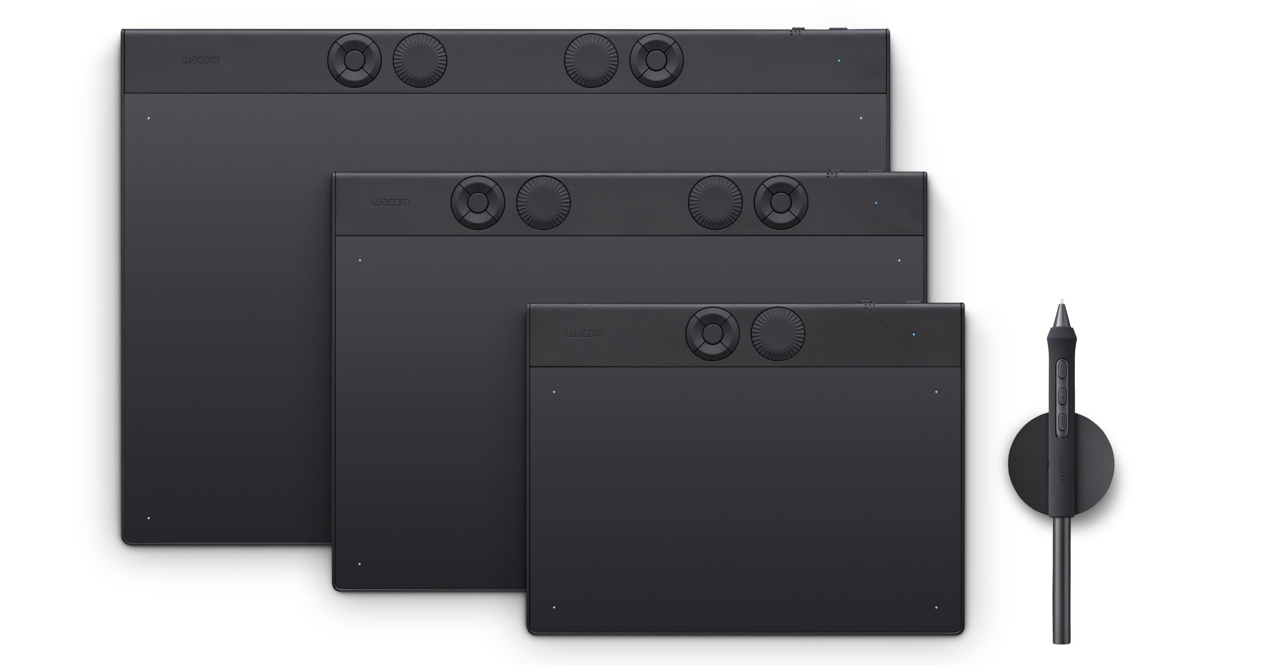 The 2025 Wacom Intuos Pro drawing tablets in small, medium, and large, alongside the Pro Pen 3.