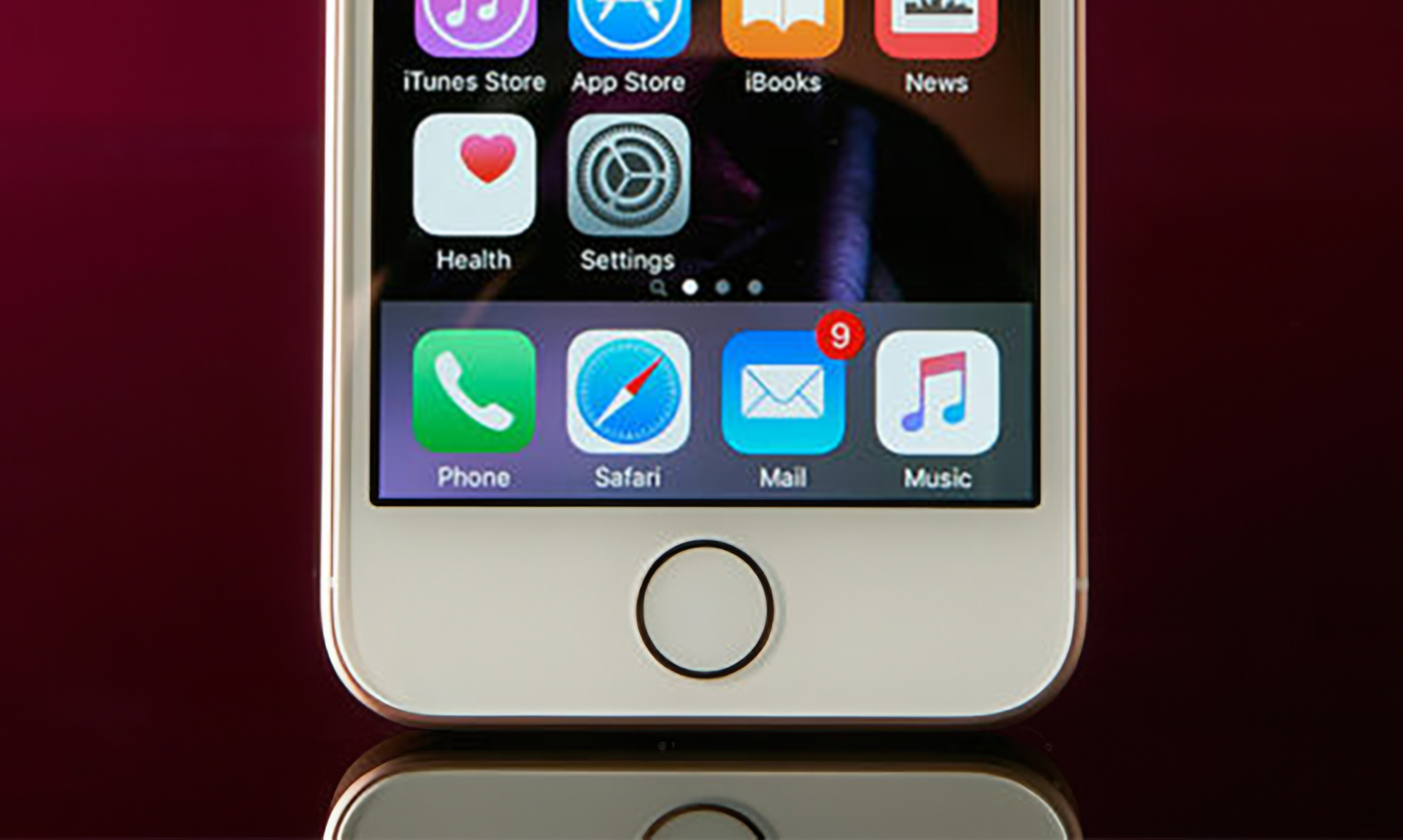 Closeup of the iPhone 5s, showing its Touch ID home button.