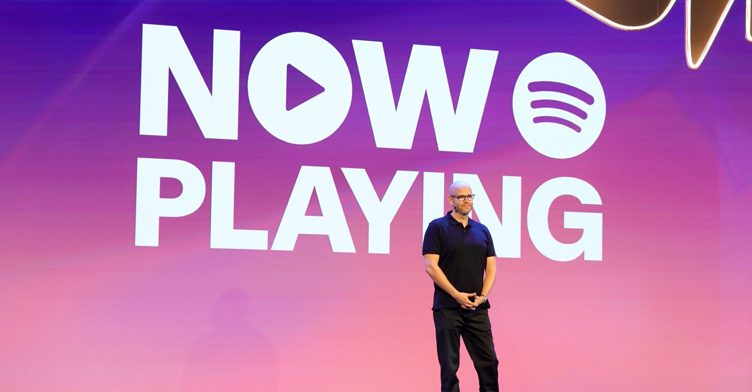 A photo of Spotify CEO Daniel Ek on a stage.