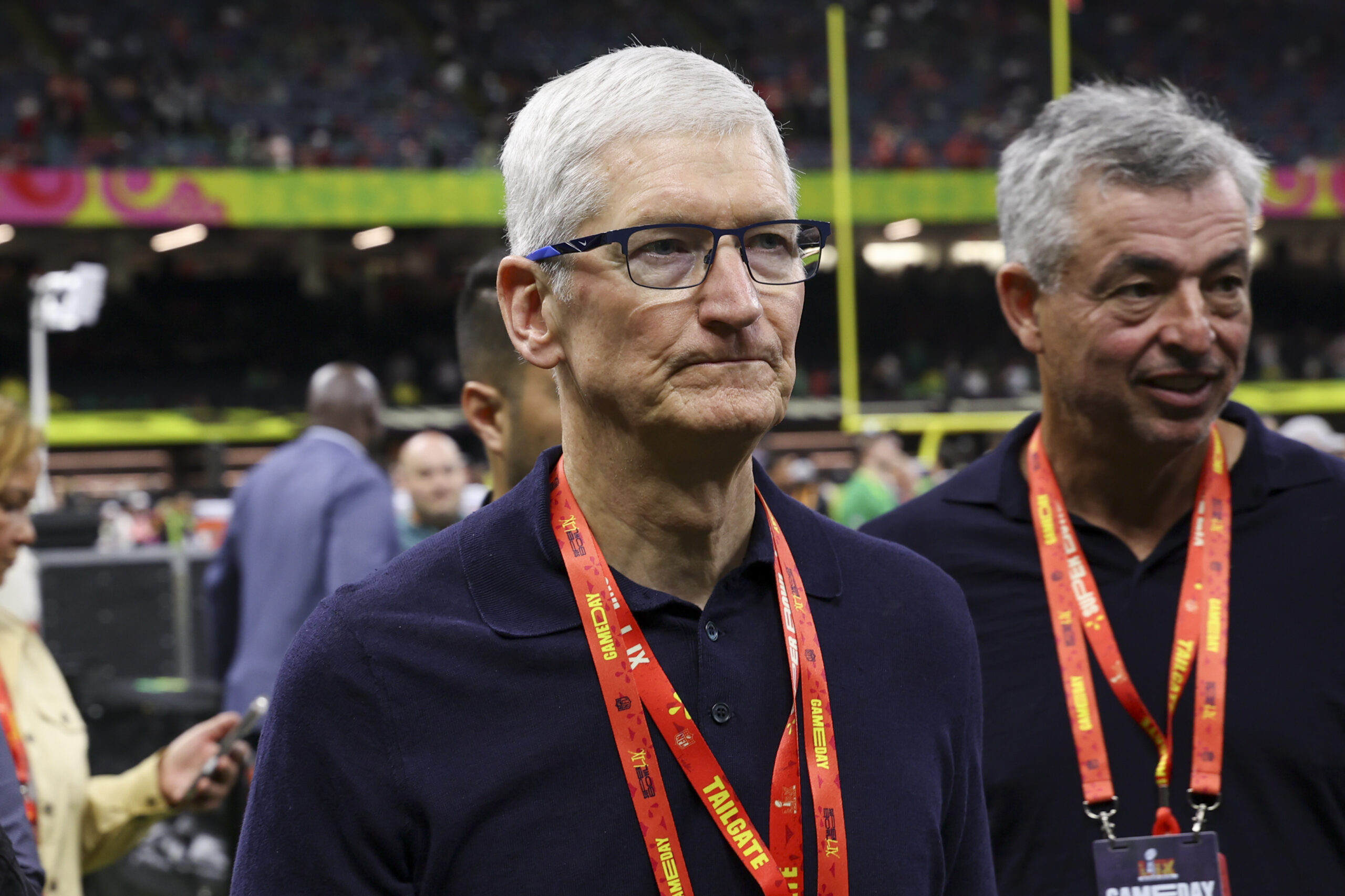 NEW ORLEANS, LOUISIANA - FEBRUARY 09: Apple CEO Tim Cook is seen on the field prior to Super Bowl LIX between the Philadelphia Eagles and Kansas City Chiefs at Caesars Superdome on February 09, 2025, in New Orleans, Louisiana. The Eagles defeated the Chiefs 40-22. (Kara Durrette/Getty Images)