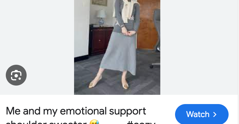 Another one of Pinover’s Instagram posts, this time of her in the same office modeling a gray skirt and top.