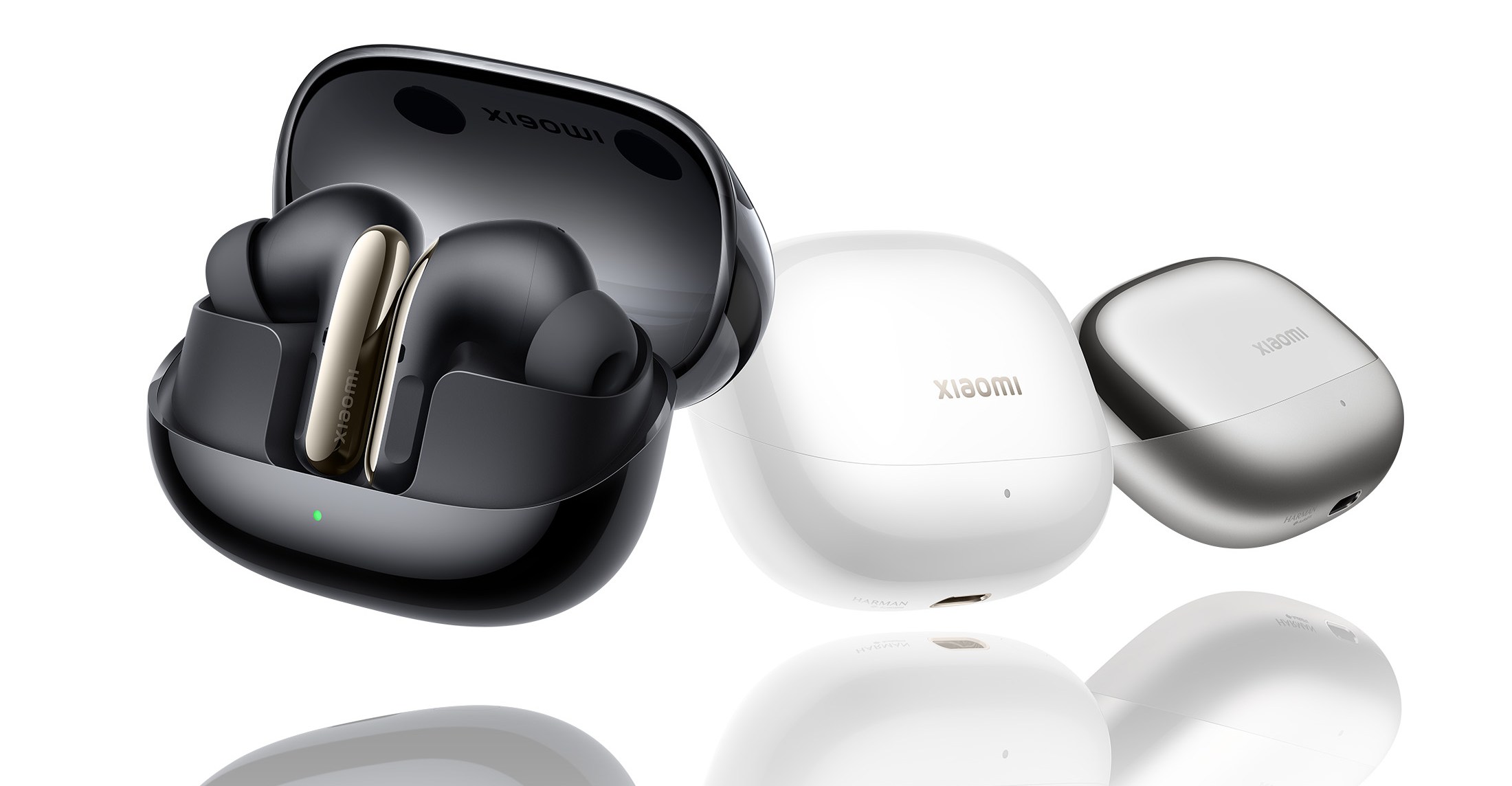 The Xiaomi Buds 5 Pro in three different charging cases.