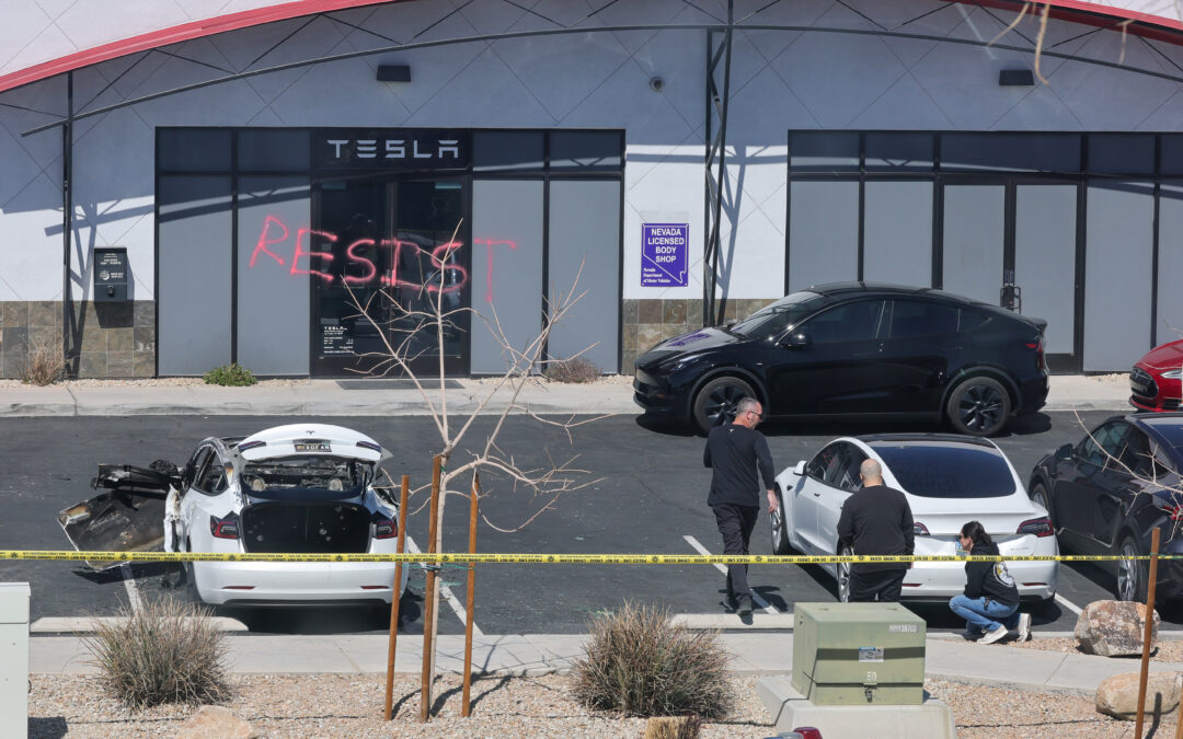 US attorney general re-announces ‘severe’ charges against alleged Tesla arsonists