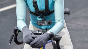 The Insta360 X5 worn by someone riding a bike.