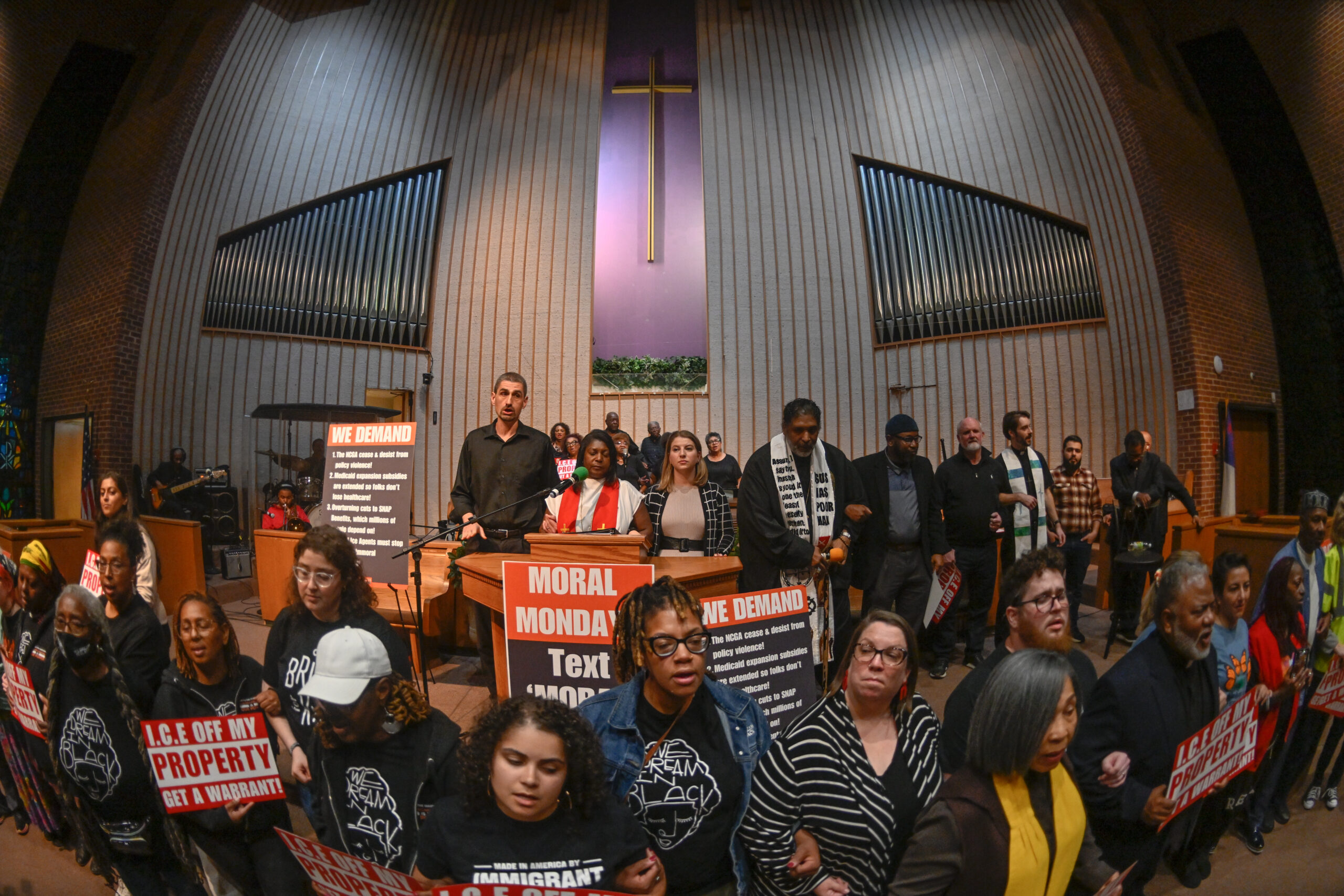 A large gathering in support of immigrants inside a North Carolina church
