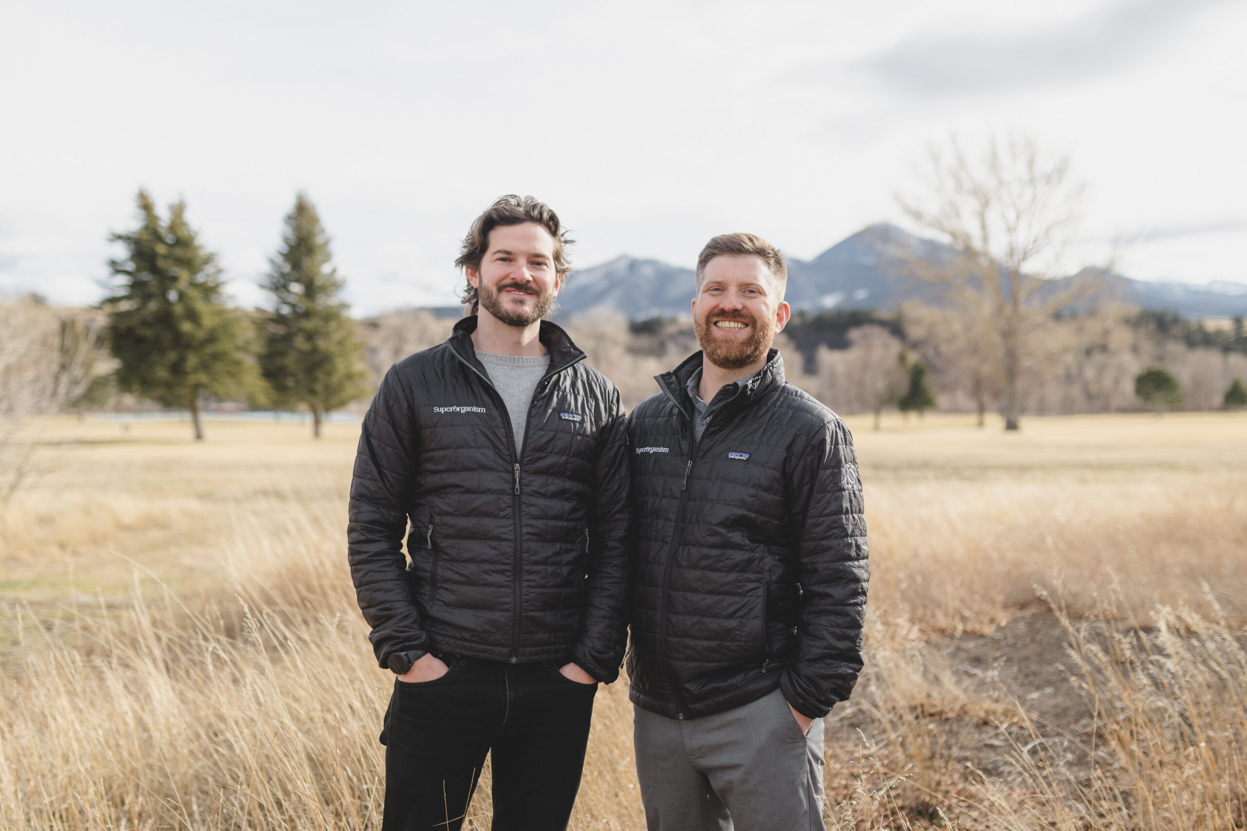 Two men standing side by side