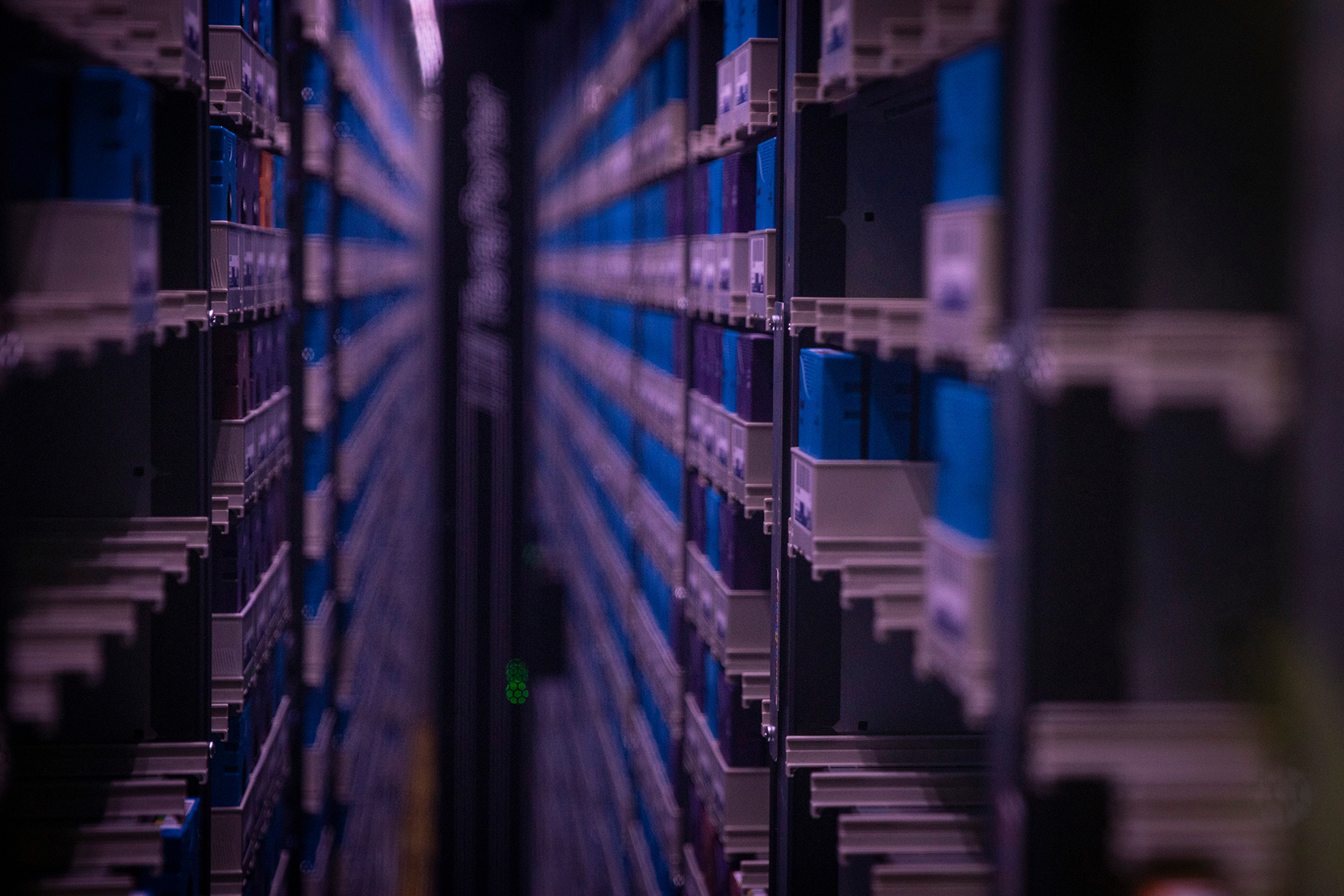 Magnetic tapes organized in a dark, narrow passage Magnetic tapes organized in a dark, narrow passage