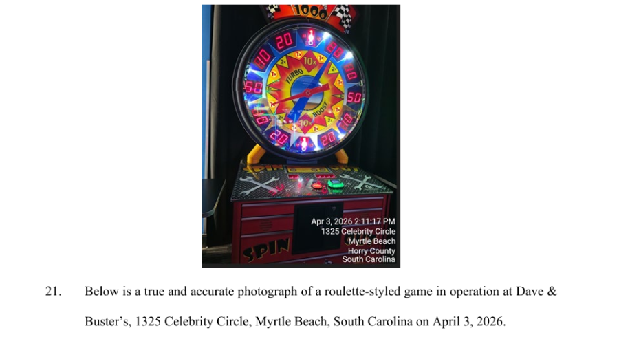 Roulette-style arcade game machine at Dave & Buster’s Myrtle Beach location with spinning wheel, flashing lights, and ticket-based prize gameplay