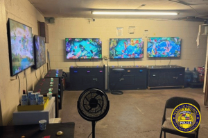 Honolulu police raid Kalihi illegal gambling room, arrest two suspects, seizing machines