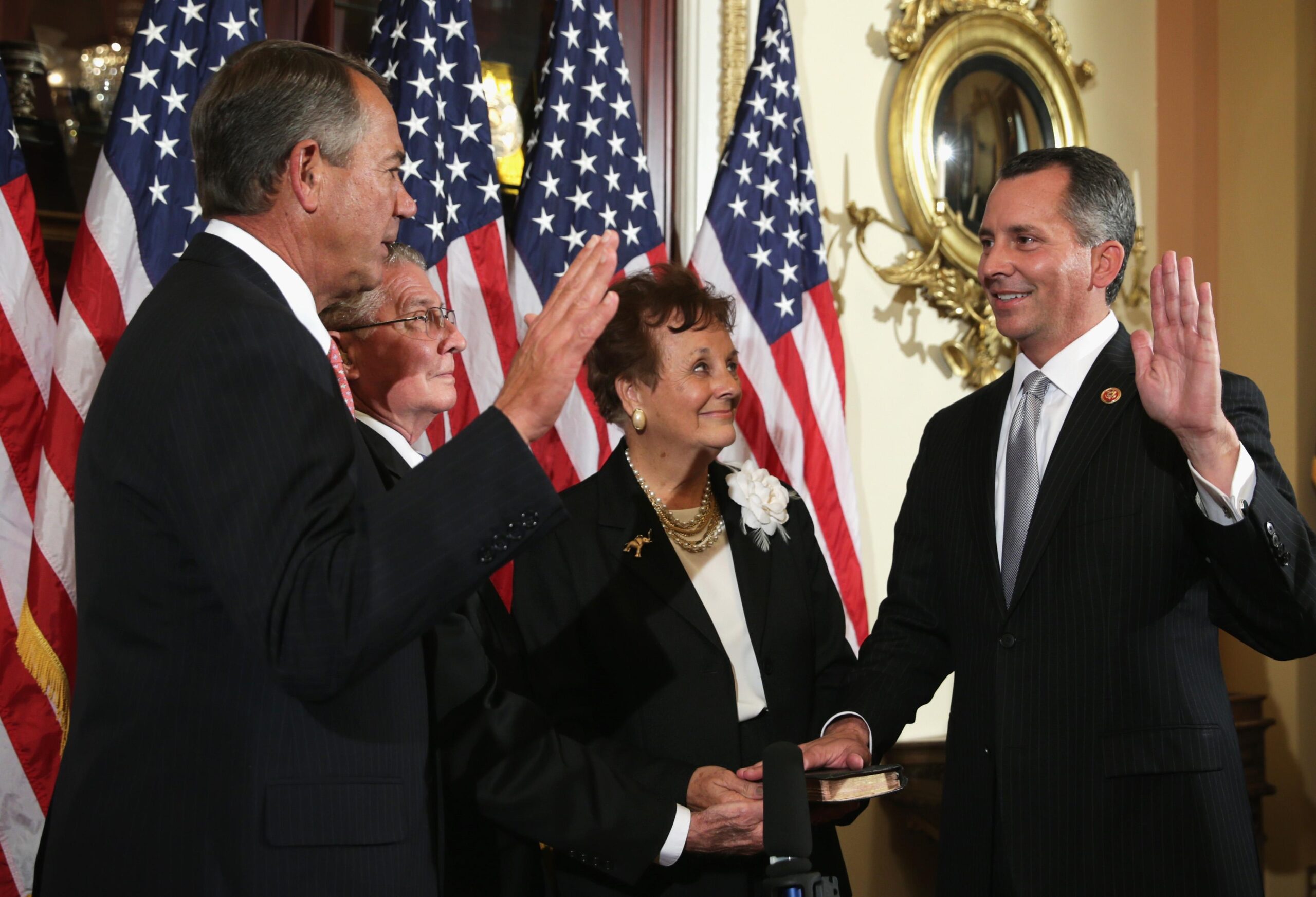 Then-Speaker of the House John Boehner swears in Rep. David Jolly in 2014