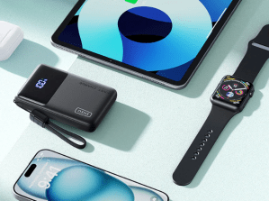 The Iniu P55-E2 power bank next to an iPad, iPhone, and Apple Watch.