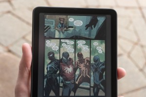 A close-up of the Amazon Kindle Colorsoft e-reader with a Spider-Man comic on screen.