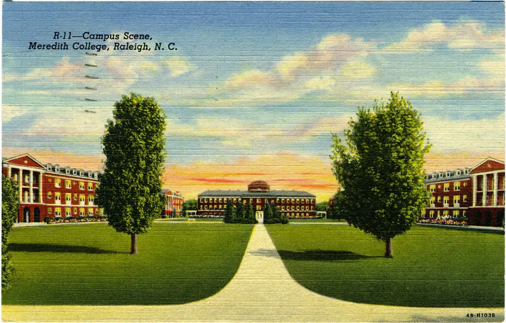 Vintage postcard view of the Meredith College campus in Raleigh, North Carolina, showing brick buildings and a green lawn.